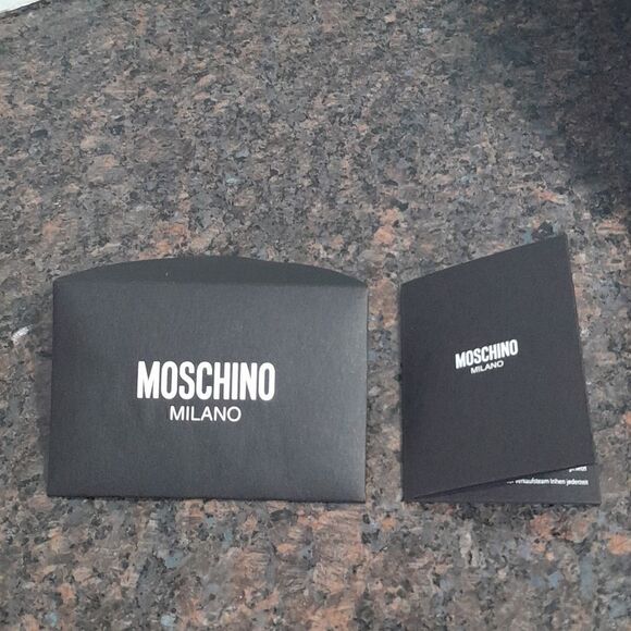 4 Moschino Deluxe Boxes, 4 Deluxe Dust Bags, and 1 and one Enclosure. main image 6